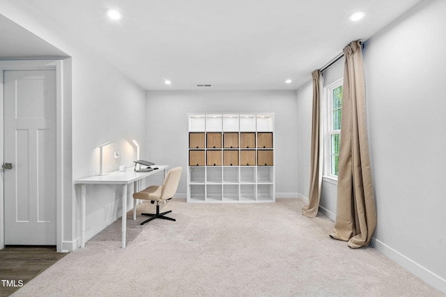 carpeted office space with baseboards, visible vents, and recessed lighting