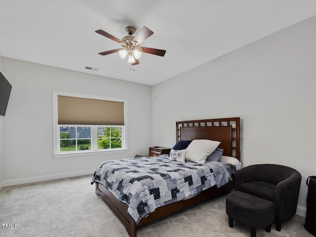 bedroom featuring carpet flooring, baseboards, and a ceiling fan