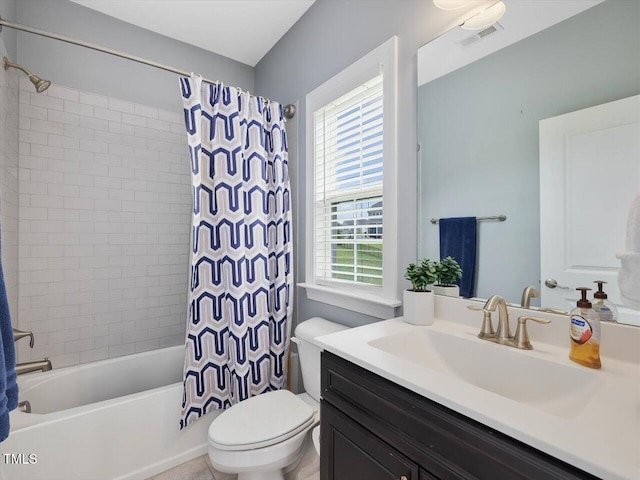 bathroom with healthy amount of natural light, toilet, vanity, and shower / bath combination with curtain