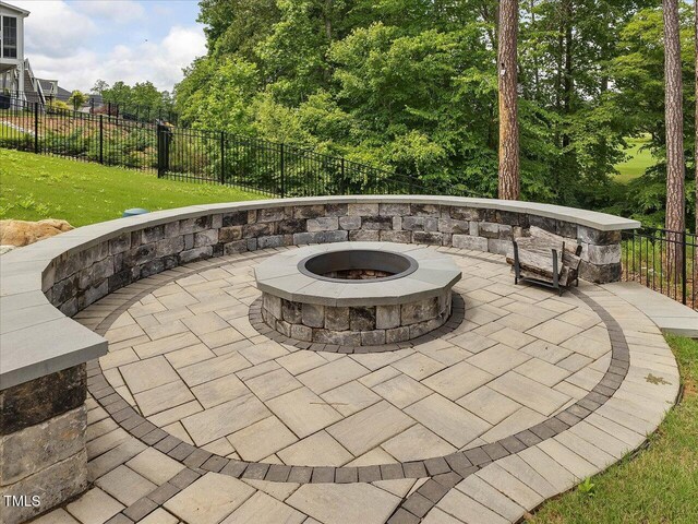 view of patio / terrace featuring a fire pit