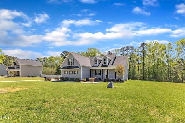 1077 Williams-White Rd, Zebulon, NC 27597 - view of front facade with a porch and a front lawn