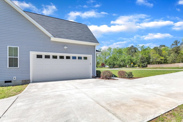 1077 Williams-White Rd, Zebulon, NC 27597 - garage featuring driveway