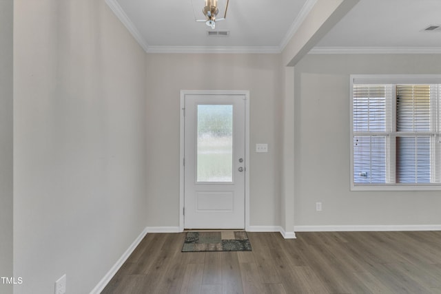 1077 Williams-White Rd, Zebulon, NC 27597 - entrance foyer featuring crown molding, wood finished floors, baseboards, and visible vents