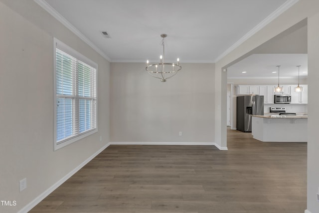 1077 Williams-White Rd, Zebulon, NC 27597 - unfurnished dining area featuring crown molding, visible vents, a notable chandelier, and dark wood-type flooring