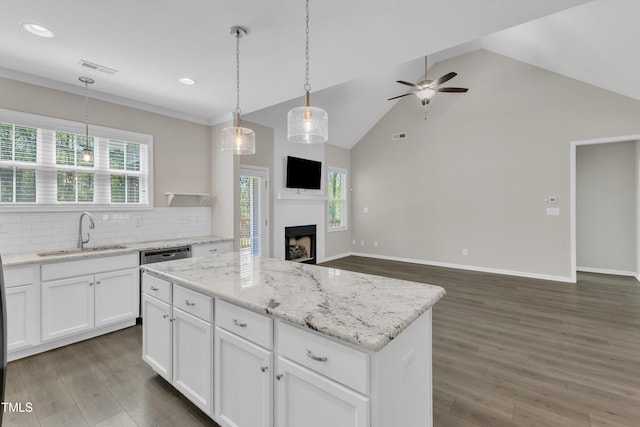 1077 Williams-White Rd, Zebulon, NC 27597 - kitchen with dark wood-type flooring, a center island, a sink, and ceiling fan