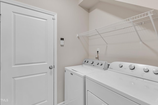 1077 Williams-White Rd, Zebulon, NC 27597 - clothes washing area featuring separate washer and dryer and laundry area