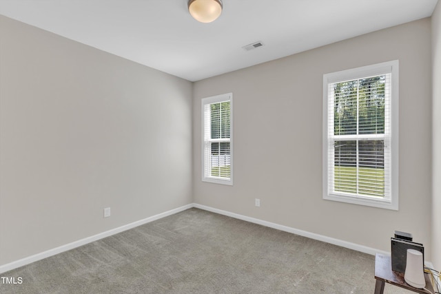 1077 Williams-White Rd, Zebulon, NC 27597 - carpeted spare room with baseboards and visible vents