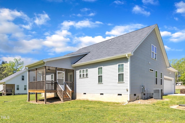 1077 Williams-White Rd, Zebulon, NC 27597 - rear view of house with a sunroom, cooling unit, crawl space, a lawn, and a garage