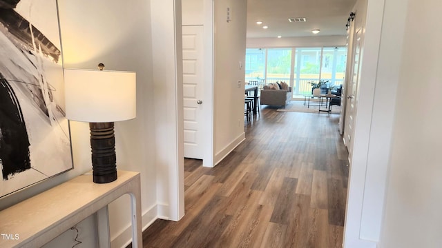 1237 Porters Call Dr, Wendell, NC 27591 - hall featuring dark wood finished floors and recessed lighting