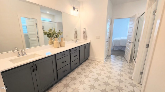 1237 Porters Call Dr, Wendell, NC 27591 - full bath with tile patterned floors, double vanity, and ensuite bath