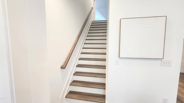 1237 Porters Call Dr, Wendell, NC 27591 - staircase featuring wood finished floors