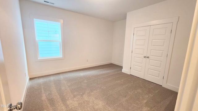 1237 Porters Call Dr, Wendell, NC 27591 - unfurnished bedroom with carpet floors and a closet