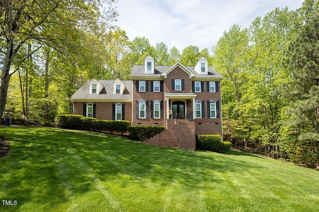 5025 Martin Farm Rd, Raleigh, NC 27613 - colonial home with brick siding and a front lawn