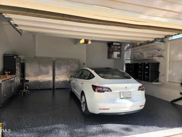 5025 Martin Farm Rd, Raleigh, NC 27613 - garage featuring a garage door opener