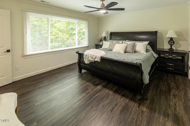 5025 Martin Farm Rd, Raleigh, NC 27613 - bedroom with crown molding, wood finished floors, baseboards, and ceiling fan