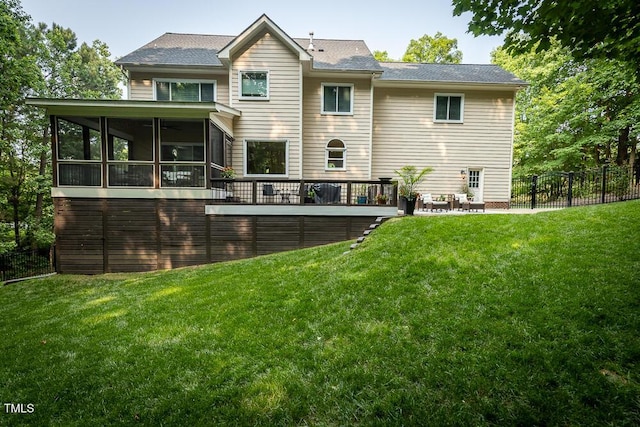 5025 Martin Farm Rd, Raleigh, NC 27613 - rear view of property featuring a sunroom, a wooden deck, and roof with shingles