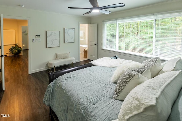 5025 Martin Farm Rd, Raleigh, NC 27613 - bedroom with dark wood finished floors, crown molding, baseboards, and a ceiling fan