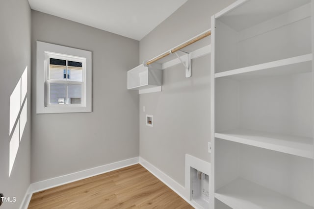 617 Ray St, Selma, NC 27576 - clothes washing area featuring light wood finished floors, laundry area, washer hookup, and baseboards