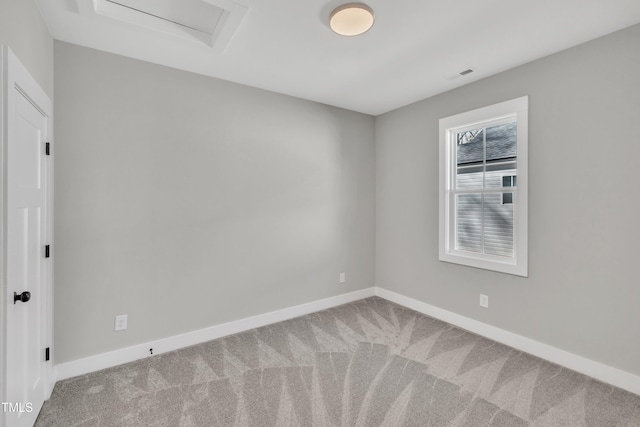 617 Ray St, Selma, NC 27576 - carpeted empty room with visible vents, baseboards, and attic access