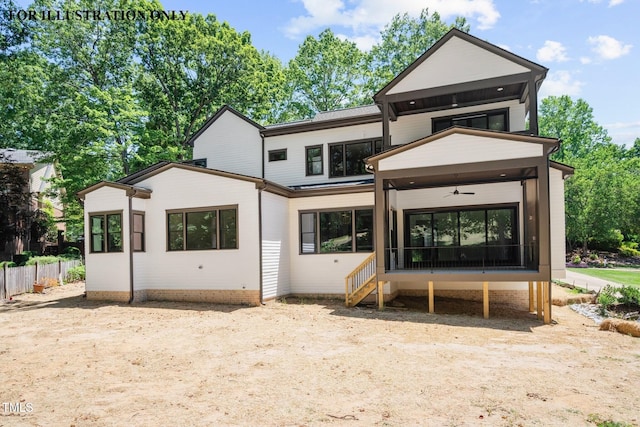 rear view of property with fence, a sunroom, and a ceiling fan