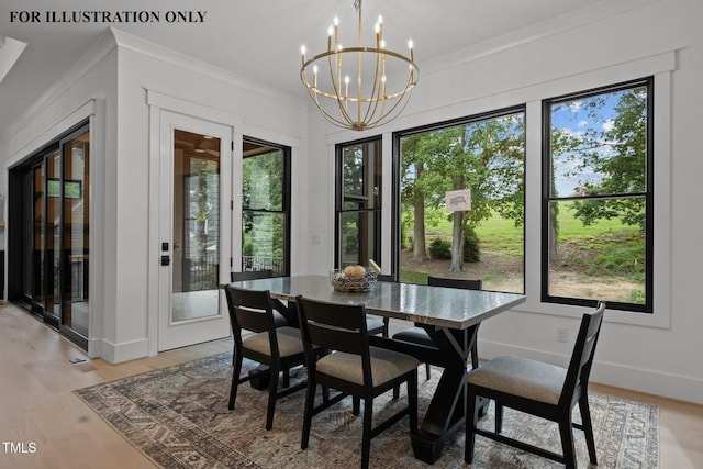 dining room with light wood-style flooring, crown molding, a notable chandelier, and baseboards