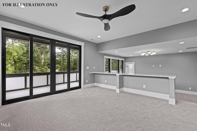unfurnished living room with carpet flooring, baseboards, and a ceiling fan