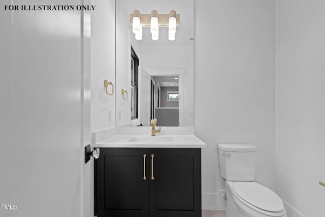 half bath with toilet, vanity, and baseboards