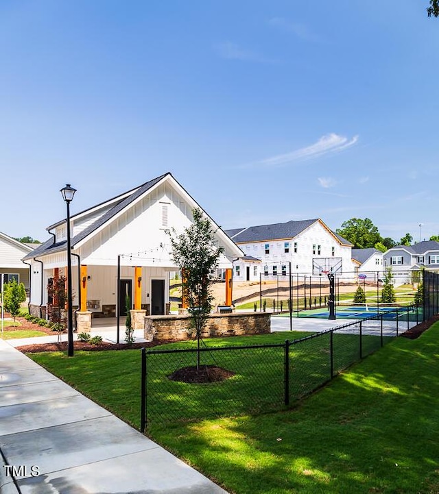 view of property's community with community basketball court and a residential view