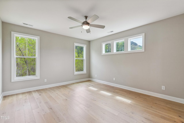 9220 Yardley Town Dr, Wake Forest, NC 27587 - unfurnished room featuring visible vents, light wood finished floors, baseboards, and ceiling fan