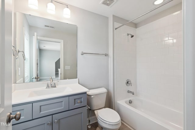 9220 Yardley Town Dr, Wake Forest, NC 27587 - bathroom with washtub / shower combination, visible vents, toilet, and vanity