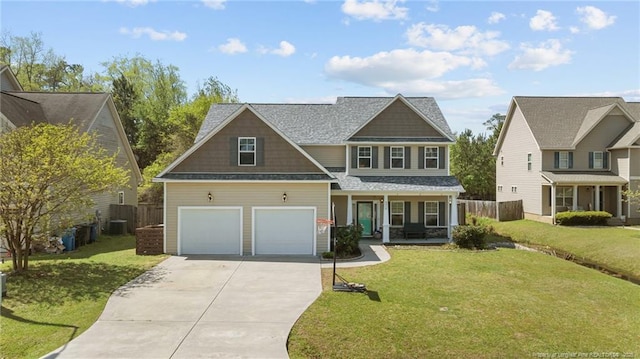 4016 Baywood Point Dr, Fayetteville, NC 28312 - craftsman-style house featuring an attached garage, covered porch, fence, concrete driveway, and a front lawn