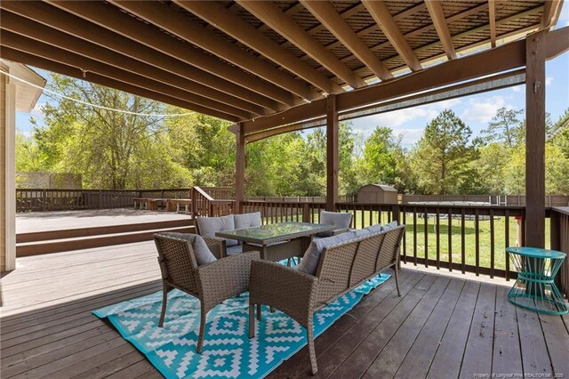 4016 Baywood Point Dr, Fayetteville, NC 28312 - deck featuring a fenced backyard, outdoor dining space, and an outdoor structure