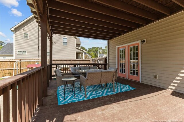 4016 Baywood Point Dr, Fayetteville, NC 28312 - wooden deck with an outdoor hangout area and fence