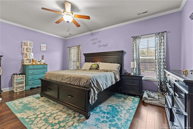 4016 Baywood Point Dr, Fayetteville, NC 28312 - bedroom featuring visible vents, baseboards, dark wood-style flooring, a ceiling fan, and crown molding