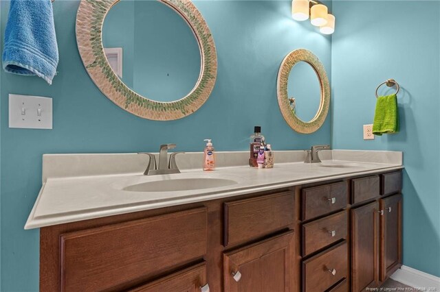 4016 Baywood Point Dr, Fayetteville, NC 28312 - full bath with a sink, baseboards, and double vanity