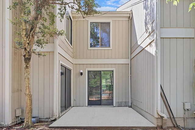 doorway to property featuring a patio