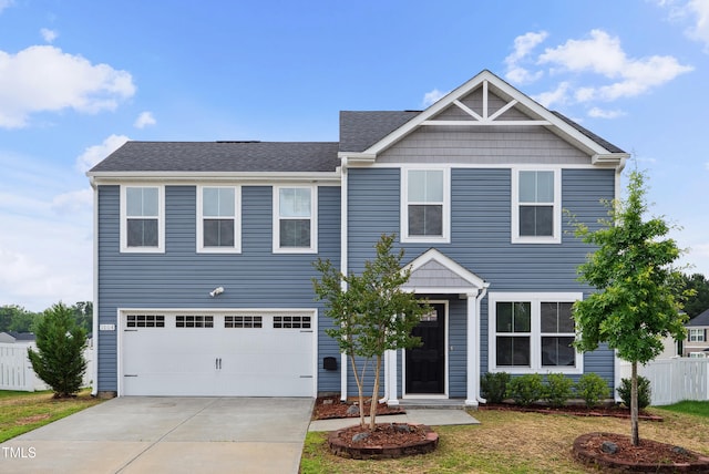 1004 Summer Mist Ln, Durham, NC 27704 - view of front of house featuring driveway, a garage, and a shingled roof
