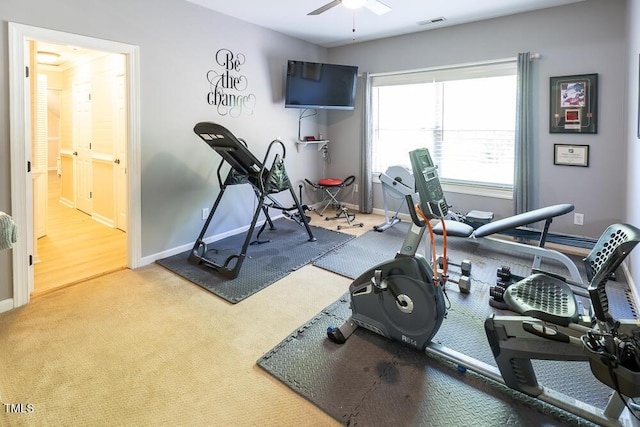 workout room featuring ceiling fan, visible vents, baseboards, and carpet