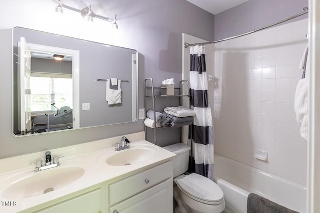 full bathroom featuring double vanity, toilet, a sink, and shower / bath combo with shower curtain