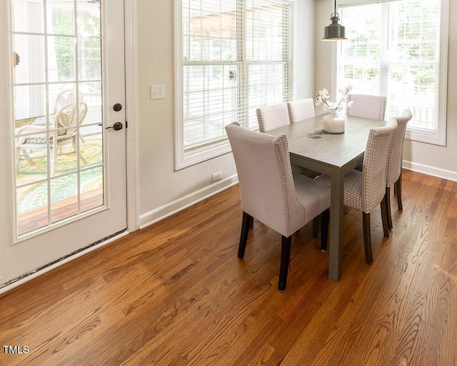 5129 Bartons Enclave Ln, Raleigh, NC 27613 - dining room featuring baseboards and dark wood-style floors