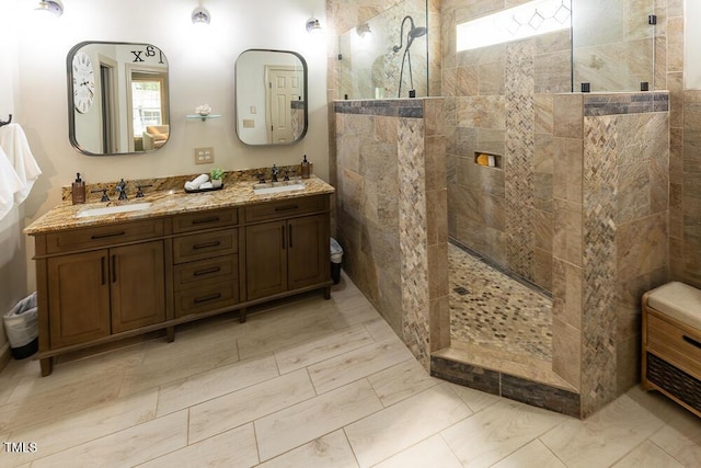 5129 Bartons Enclave Ln, Raleigh, NC 27613 - bathroom featuring a walk in shower, double vanity, and healthy amount of natural light