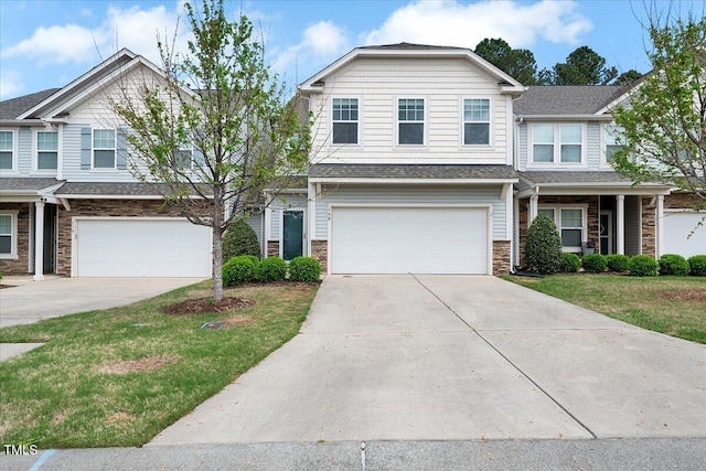 108 Princess Pl, Morrisville, NC 27560 - multi unit property featuring concrete driveway, a garage, stone siding, and a front lawn
