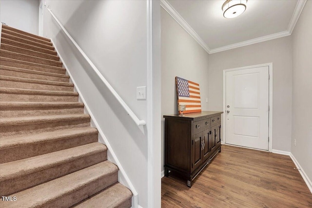 108 Princess Pl, Morrisville, NC 27560 - entrance foyer with stairway, baseboards, crown molding, and wood finished floors