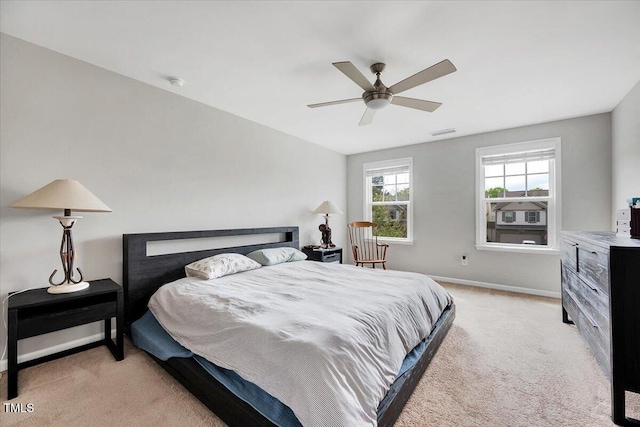 108 Princess Pl, Morrisville, NC 27560 - bedroom featuring light colored carpet, baseboards, a ceiling fan, and visible vents