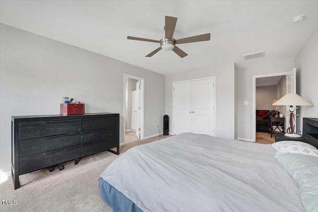 108 Princess Pl, Morrisville, NC 27560 - carpeted bedroom featuring a closet, baseboards, ensuite bath, a ceiling fan, and visible vents