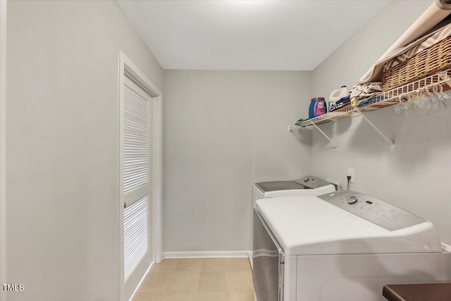 108 Princess Pl, Morrisville, NC 27560 - laundry room featuring laundry area, baseboards, and washing machine and dryer