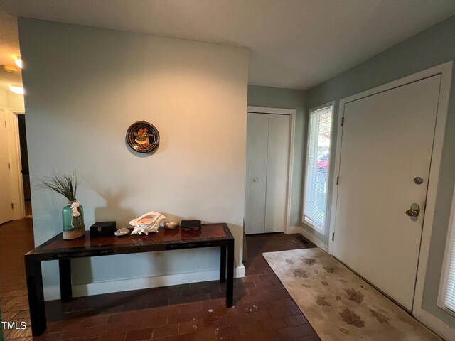 106 Orchard Rd, Henderson, NC 27536 - entrance foyer with brick patterned flooring