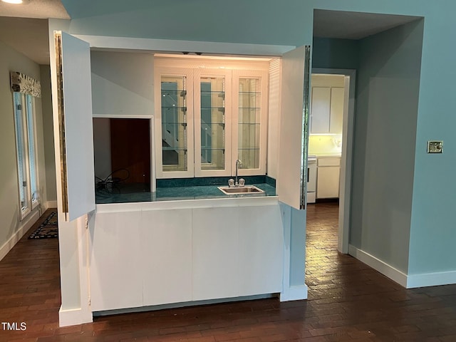 106 Orchard Rd, Henderson, NC 27536 - kitchen featuring a sink and baseboards