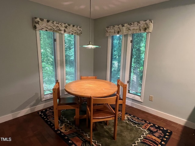106 Orchard Rd, Henderson, NC 27536 - dining space with baseboards and dark wood-style floors