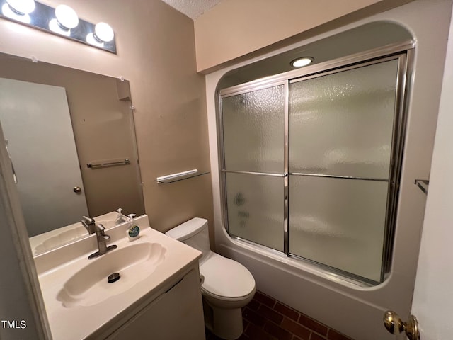 106 Orchard Rd, Henderson, NC 27536 - bathroom featuring toilet, shower / bath combination with glass door, and vanity